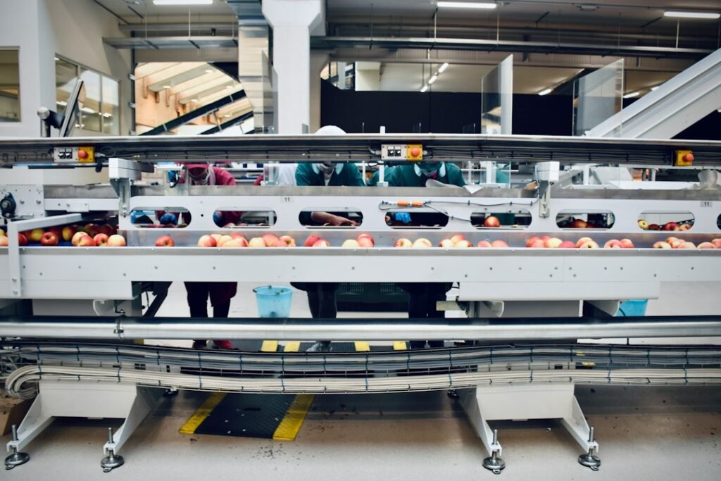 Automated warehouse conveyor representing parcel dimensioning and measurement systems