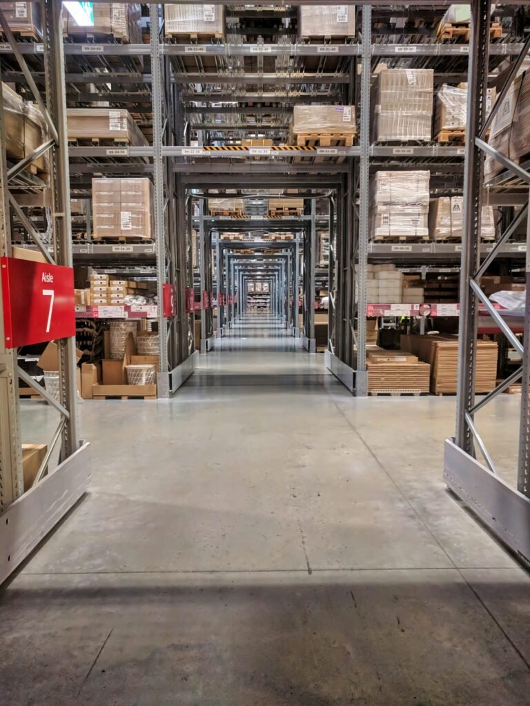 Warehouse aisles with pallet racks and boxed inventory